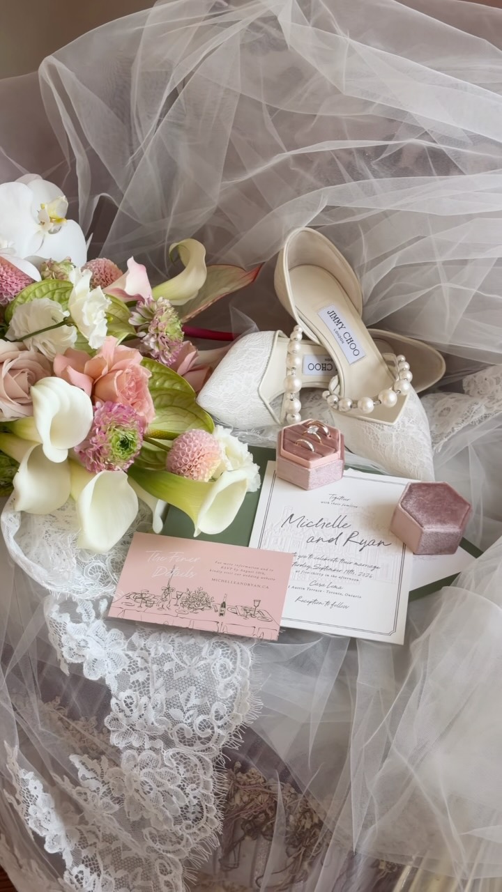 Wedding flowers, rings, and invitations captured by Yours Truly Socials